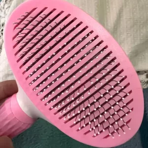Escova de remoção de pelos de cão autolimpante recebida do cliente T***r.