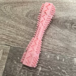Brinquedo de mastigar para limpeza dos dentes recebido da cliente L***a.