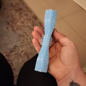 Brinquedo de mastigar para limpeza dos dentes do cão recebido da cliente K***a.